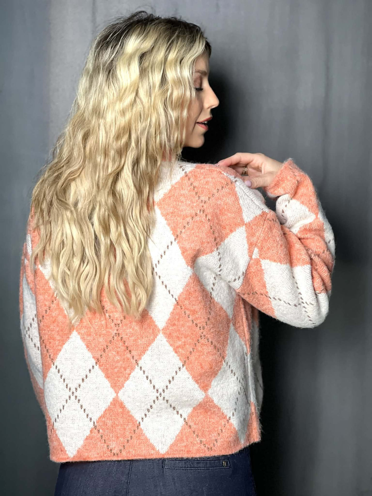 Pull orange et gris